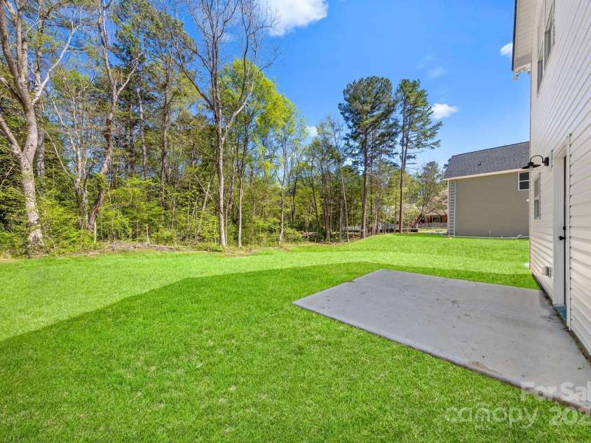 1615 Carlton Avenue, Kannapolis, NC 28083.  MLS# CAR4234885, YatesRealty ID 15199. Back Patio