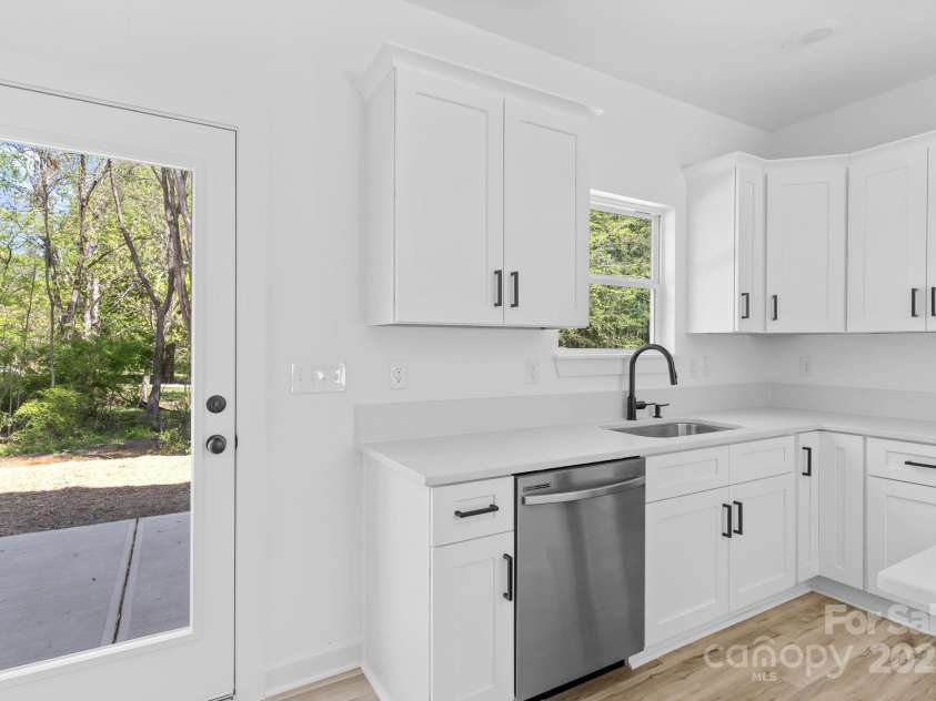 1615 Carlton Avenue, Kannapolis, NC 28083.  MLS# CAR4234885, YatesRealty ID 15199. Back Patio Door- Kitchen