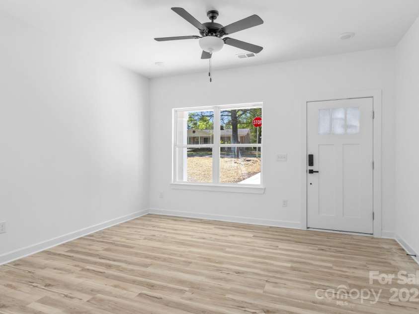 1615 Carlton Avenue, Kannapolis, NC 28083.  MLS# CAR4234885, YatesRealty ID 15199. Living Room- Front Door