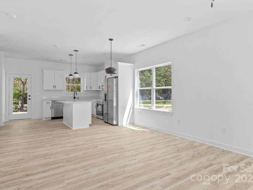 1615 Carlton Avenue, Kannapolis, NC 28083.  MLS# CAR4234885, YatesRealty ID 15199. Living room-Kitchen