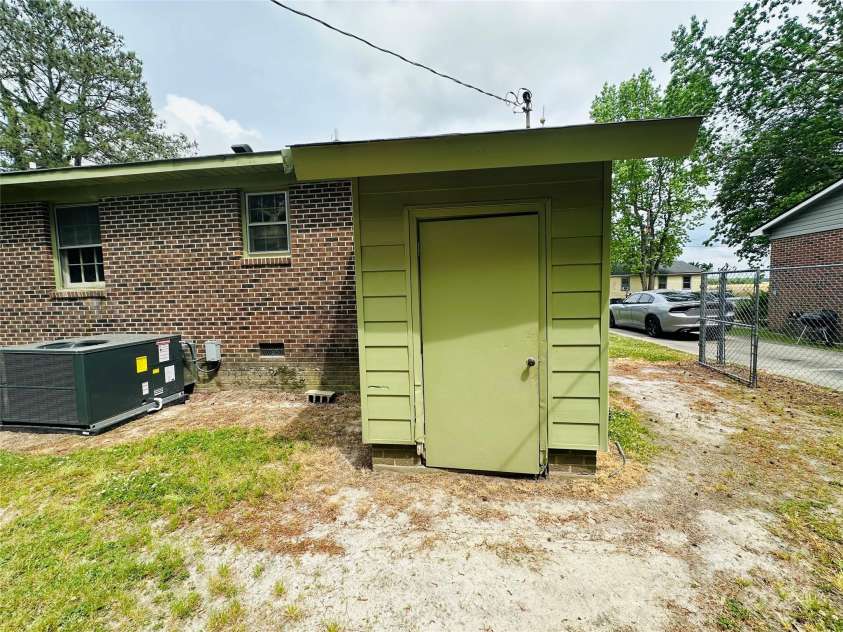 612 Dr Martin Luther King Jr Avenue, Enfield, NC 27823.  MLS# CAR4145152, YatesRealty ID 152. Attached Storage Shed