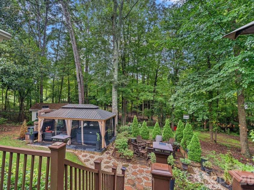 172 Tawny Bark Drive, Mooresville, NC 28117.  MLS# CAR4332757, YatesRealty ID 15204. Backyard paradise includes gazebo with outdoor fireplace, spa (optional) and firepit