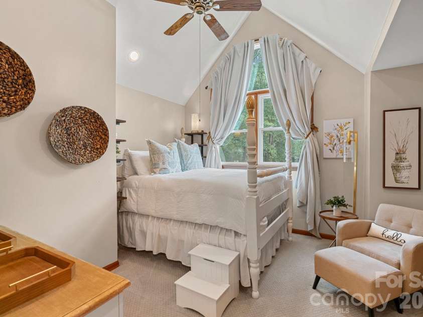 172 Tawny Bark Drive, Mooresville, NC 28117.  MLS# CAR4332757, YatesRealty ID 15204. Bedroom 2 with vaulted ceiling