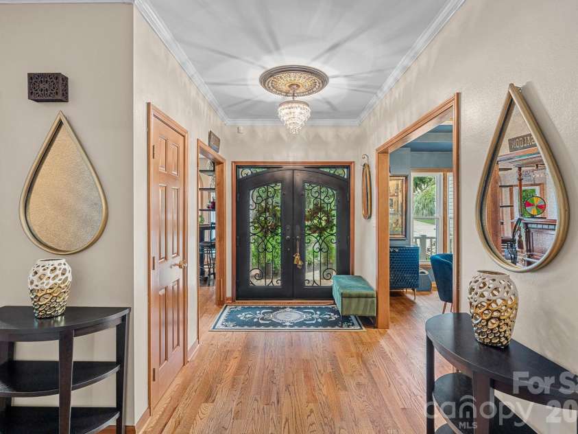 172 Tawny Bark Drive, Mooresville, NC 28117.  MLS# CAR4332757, YatesRealty ID 15204. New custom wrought iron double front doors