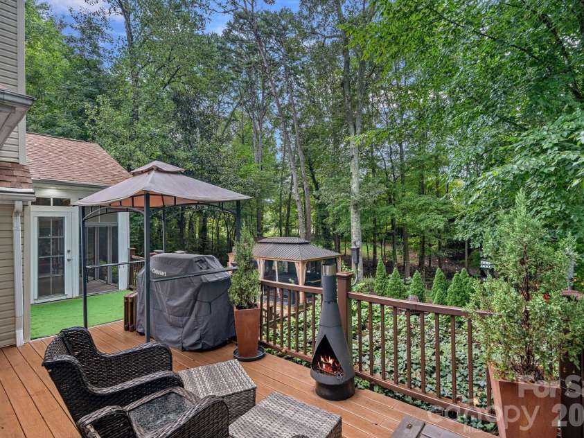 172 Tawny Bark Drive, Mooresville, NC 28117.  MLS# CAR4332757, YatesRealty ID 15204. Open composite deck with grilling area