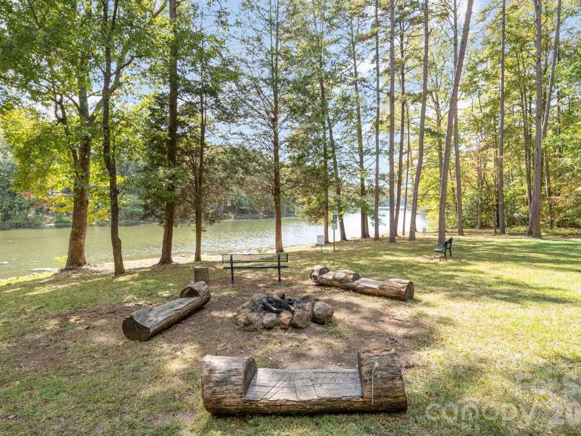 6111 Latta Springs Circle, Huntersville, NC 28078.  MLS# CAR4371848, YatesRealty ID 15205. Lakefront firepit area, canoe racks
