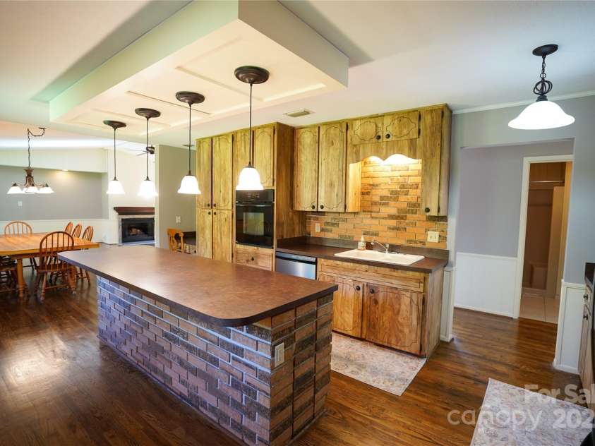262 Rooster Cove, Brevard, NC 28712.  MLS# CAR4332799, YatesRealty ID 15209. Kitchen and hallway entry