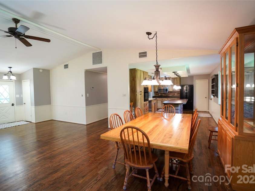 262 Rooster Cove, Brevard, NC 28712.  MLS# CAR4332799, YatesRealty ID 15209. Living/dining area and kitchen