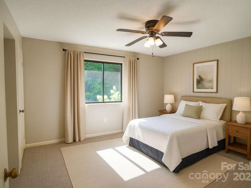 262 Rooster Cove, Brevard, NC 28712.  MLS# CAR4332799, YatesRealty ID 15209. Main level bedroom, staged virtually