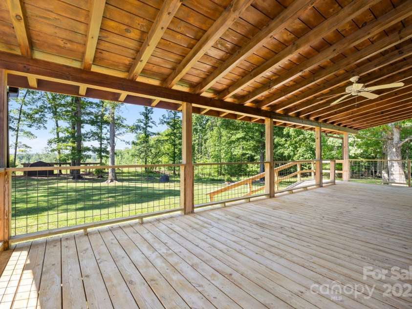 11227 Cool Springs Road, Cleveland, NC 27013.  MLS# CAR4257967, YatesRealty ID 15210. 12 x 34 Covered Back Deck with Ceiling Fan, Entry Ramp, and power Cord hook up for Hot Tub!