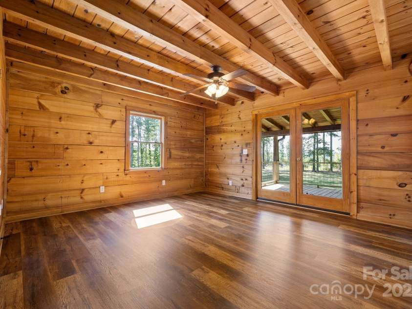 11227 Cool Springs Road, Cleveland, NC 27013.  MLS# CAR4257967, YatesRealty ID 15210. Owner's Suite on the main level with french doors that lead to the oversized back deck and hot tub area!