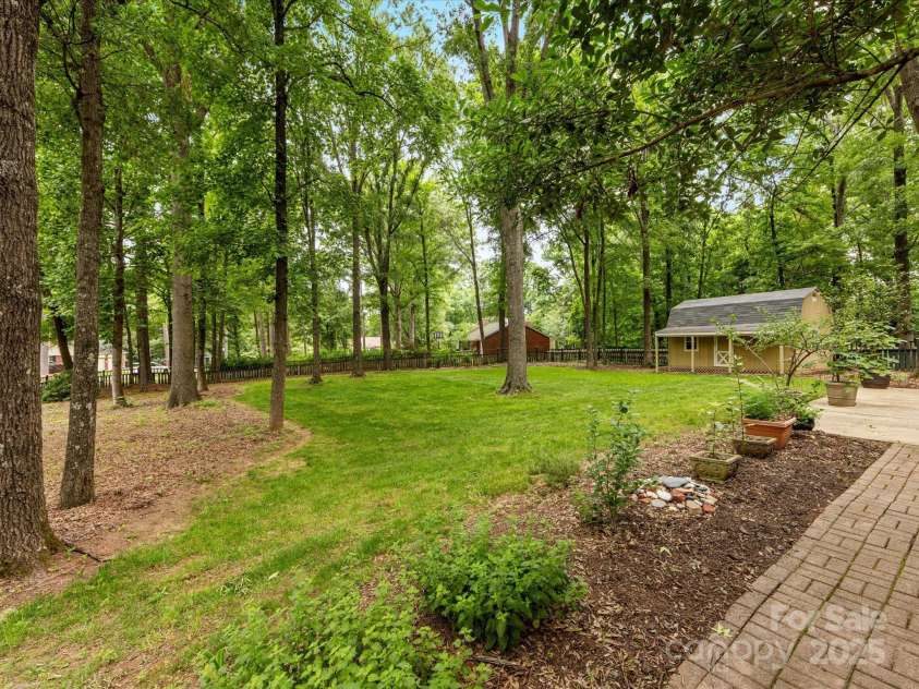 8201 Lansford Road, Charlotte, NC 28277.  MLS# CAR4261178, YatesRealty ID 15211. Backyard Approx. 0.61 acres