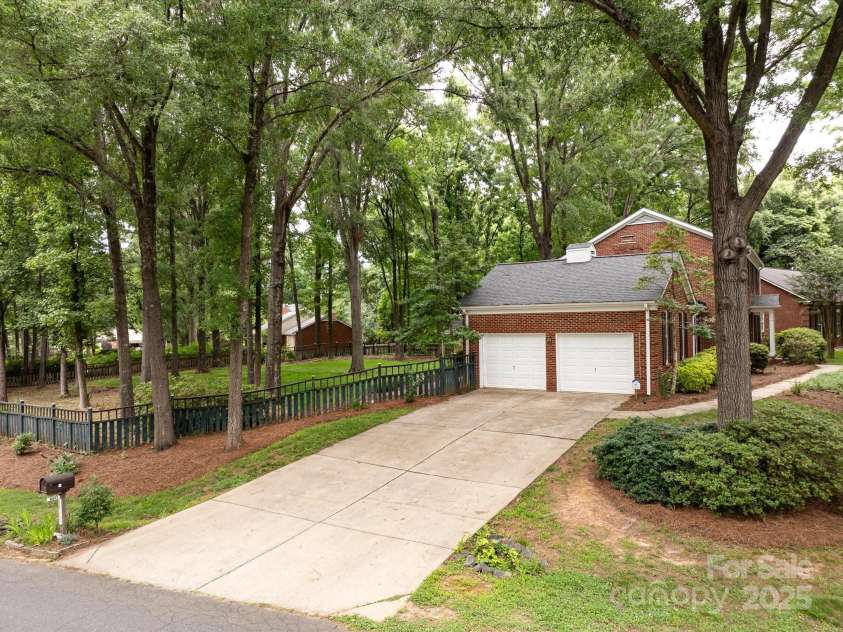 8201 Lansford Road, Charlotte, NC 28277.  MLS# CAR4261178, YatesRealty ID 15211. Two Car Garage with Concrete Driveway