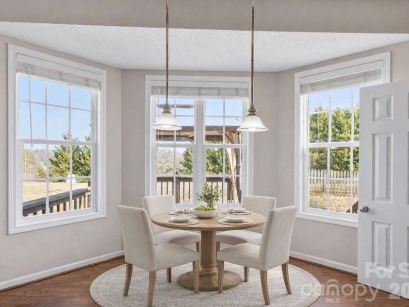 4 Carter Hill Drive, Leicester, NC 28748.  MLS# CAR4342049, YatesRealty ID 15212. Staged with AI