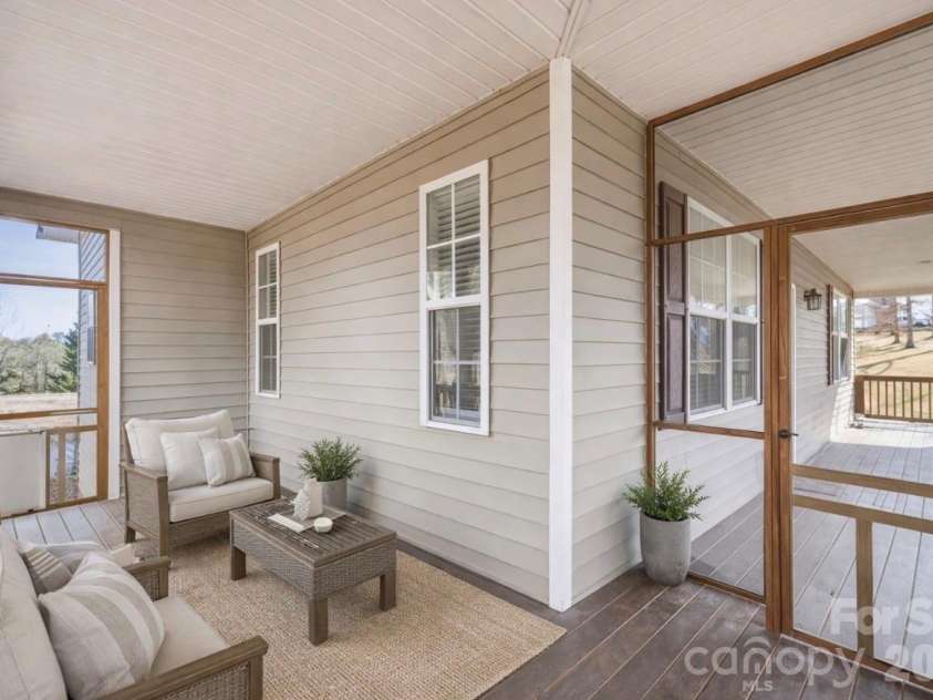 4 Carter Hill Drive, Leicester, NC 28748.  MLS# CAR4342049, YatesRealty ID 15212. Staged with AI