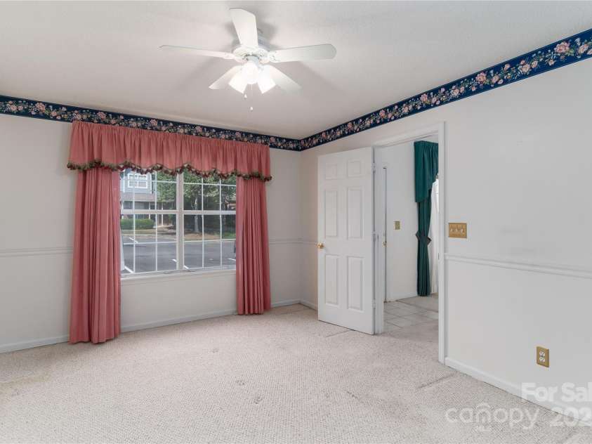 9006 Four Mile Creek Road, Charlotte, NC 28277.  MLS# CAR4260966, YatesRealty ID 15215. First Floor Primary Bedroom