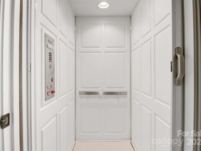 89 Wexford Point, Hickory, NC 28601.  MLS# CAR4250502, YatesRealty ID 15221. An inside view of the elevator.