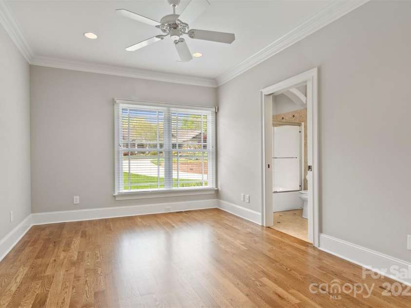 89 Wexford Point, Hickory, NC 28601.  MLS# CAR4250502, YatesRealty ID 15221. Main Level Bedroom 2 with an ensuite bath (View1)