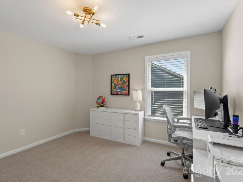 5050 Havencrest Drive, Fort Mill, SC 29715.  MLS# CAR4261068, YatesRealty ID 15224. Also off of this bedroom suite is a large closet and a walk-in attic access.