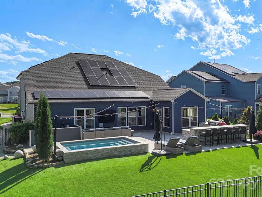 5050 Havencrest Drive, Fort Mill, SC 29715.  MLS# CAR4261068, YatesRealty ID 15224. As if the backyard didn't offer enough; artificial pet friendly turf, built in irrigation, 4 sided privacy and fully fenced with ample drainage solutions.