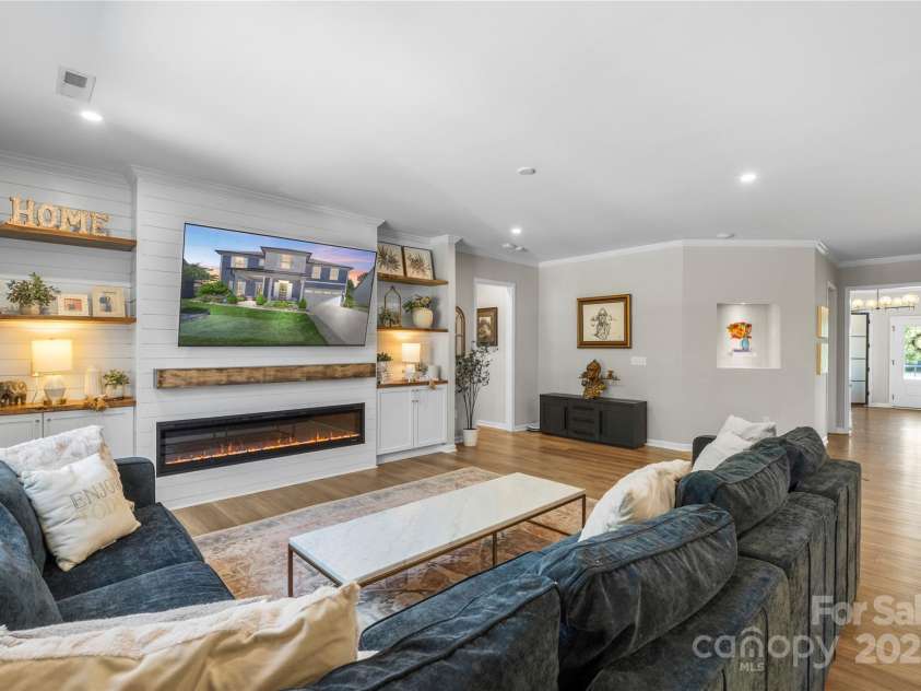 5050 Havencrest Drive, Fort Mill, SC 29715.  MLS# CAR4261068, YatesRealty ID 15224. Built in shelves, electric fireplace and cabinetry for the perfect storage solution.