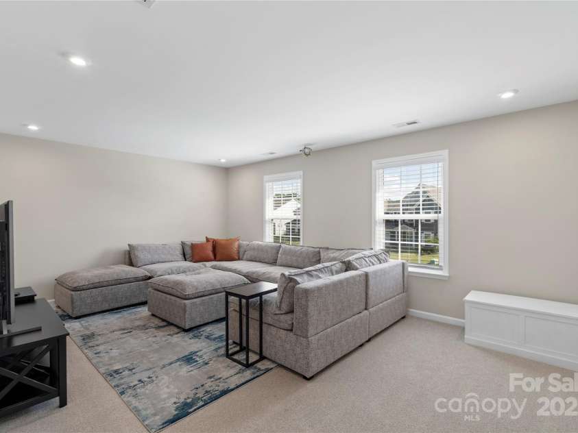 5050 Havencrest Drive, Fort Mill, SC 29715.  MLS# CAR4261068, YatesRealty ID 15224. Media/bonus room, complete with projector and AV equipment prewire.