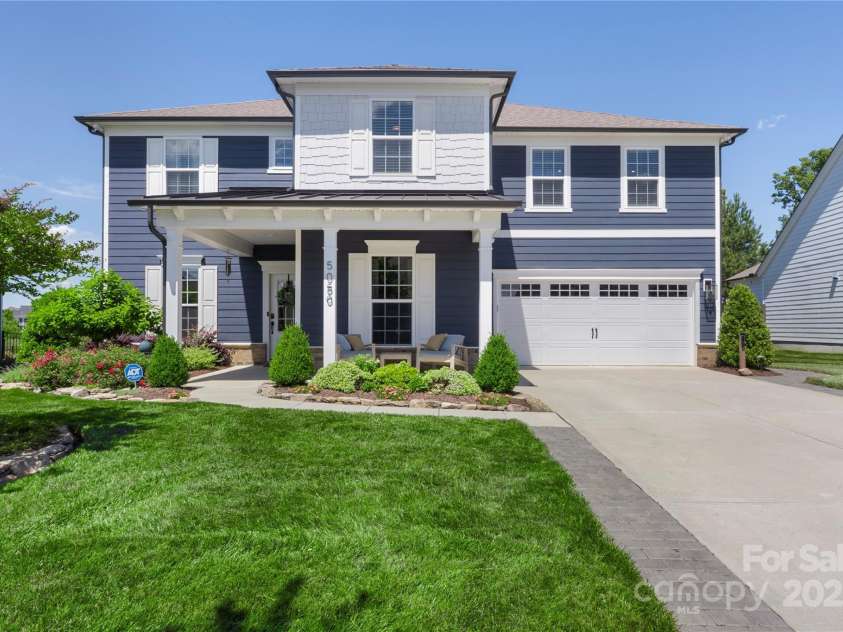 5050 Havencrest Drive, Fort Mill, SC 29715.  MLS# CAR4261068, YatesRealty ID 15224. The curb appeal is to die for. Custom landscaping + driveway widening already done for comfort of parking and enjoyment.