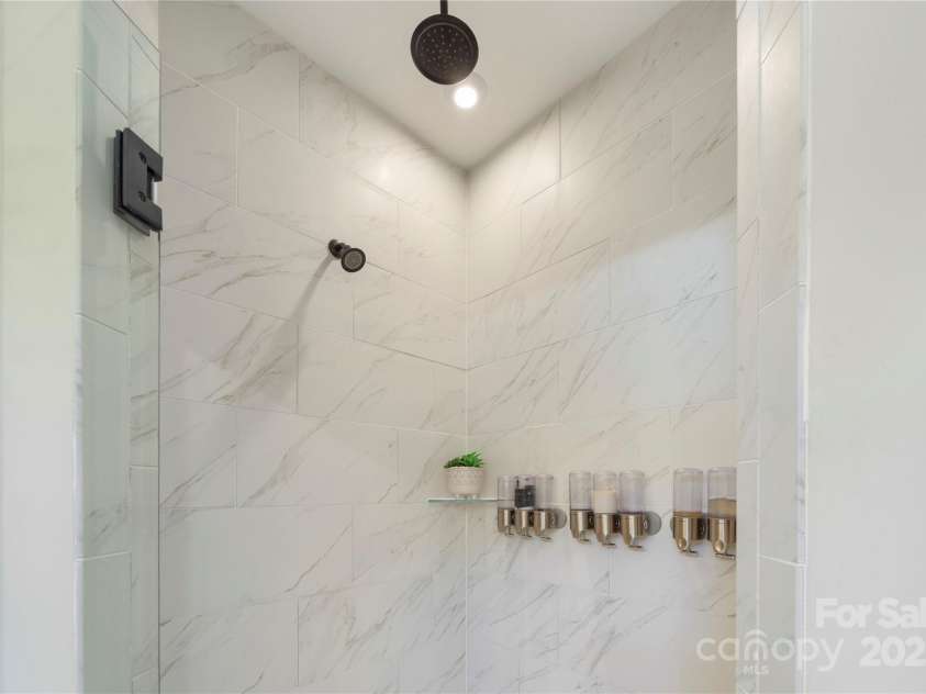 5050 Havencrest Drive, Fort Mill, SC 29715.  MLS# CAR4261068, YatesRealty ID 15224. Upgraded tile and dual head, oversized shower.