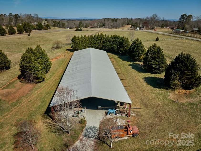 226 John Smith Road, Columbus, NC 28722.  MLS# CAR4235483, YatesRealty ID 15228. Covered Large Dressage Arena