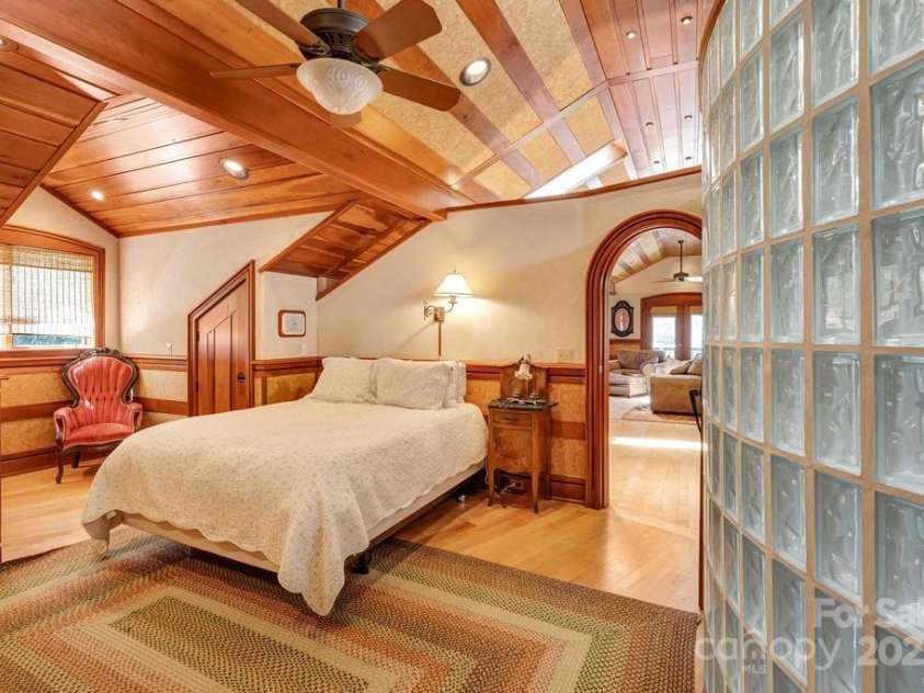 201 Hughes Creek, Columbus, NC 28722.  MLS# CAR4259120, YatesRealty ID 15229. Primary bedroom with adjacent bathroom
