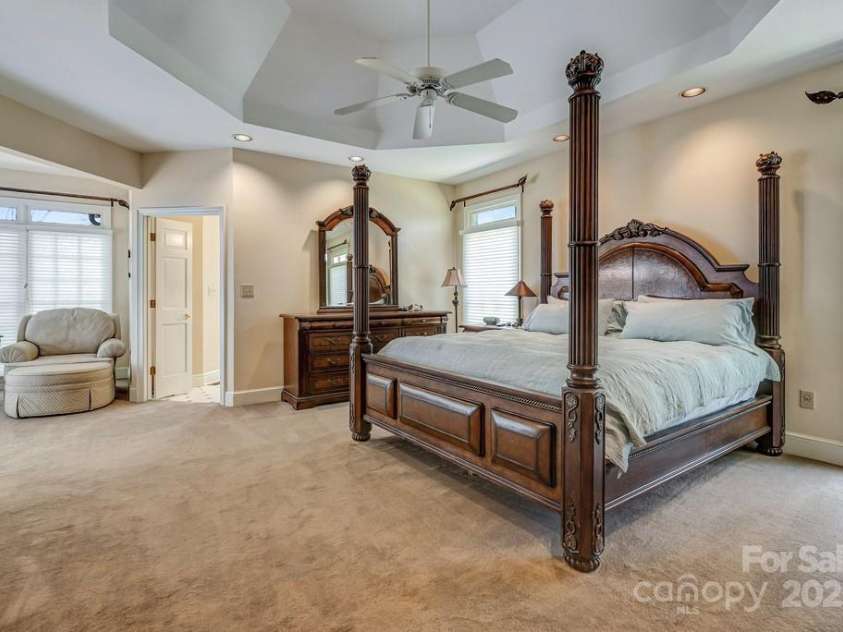 201 Hughes Creek, Columbus, NC 28722.  MLS# CAR4259120, YatesRealty ID 15229. Primary bedroom with tray ceiling