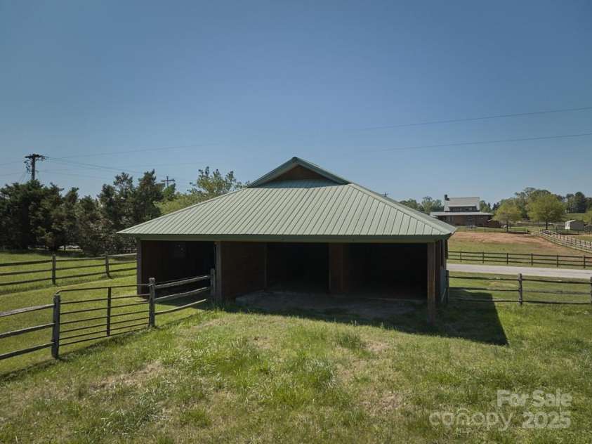 201 Hughes Creek, Columbus, NC 28722.  MLS# CAR4259120, YatesRealty ID 15229. Run-in comes with doors to add 2 add'l stalls.