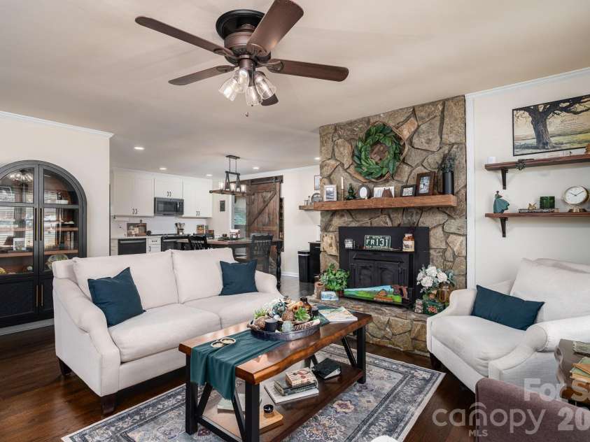 1529 Home Trail, Lincolnton, NC 28092.  MLS# CAR4372193, YatesRealty ID 15231. Inviting living room with fireplace.