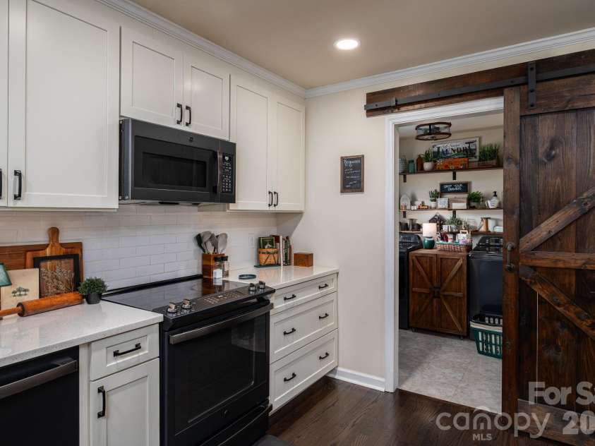 1529 Home Trail, Lincolnton, NC 28092.  MLS# CAR4372193, YatesRealty ID 15231. Looking from the kitchen to laundry room.