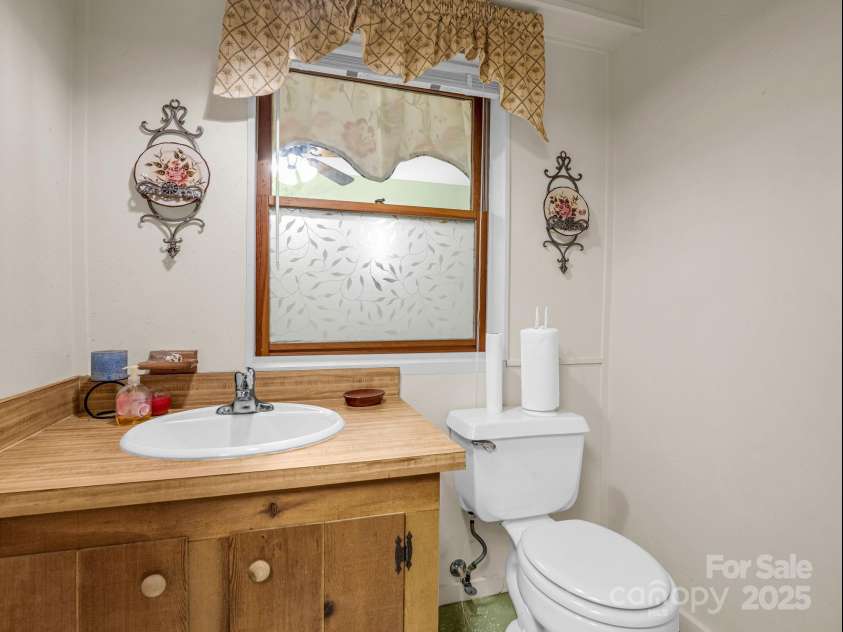 526 Shannons Walk, Lake Lure, NC 28746.  MLS# CAR4300431, YatesRealty ID 15235. Half Bathroom basement in lower area