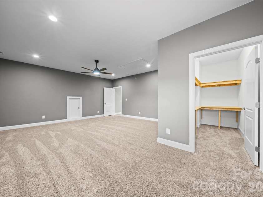 7017 Hyde Park Drive, Indian Trail, NC 28079.  MLS# CAR4369830, YatesRealty ID 15235. Upstairs bedroom has 3 storage/closet areas plus pull down attic access!