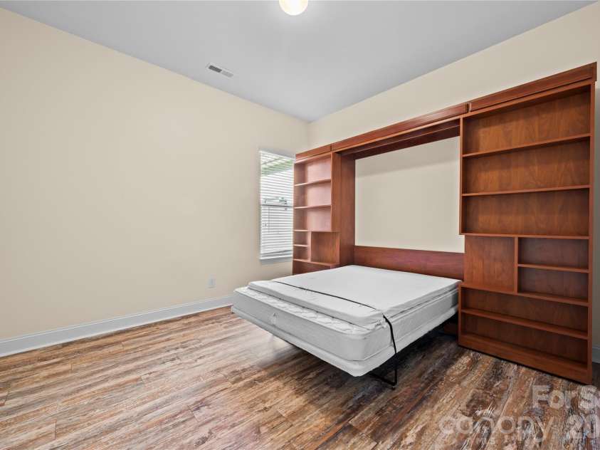 7017 Hyde Park Drive, Indian Trail, NC 28079.  MLS# CAR4369830, YatesRealty ID 15235. View of Murphy bed pulled down