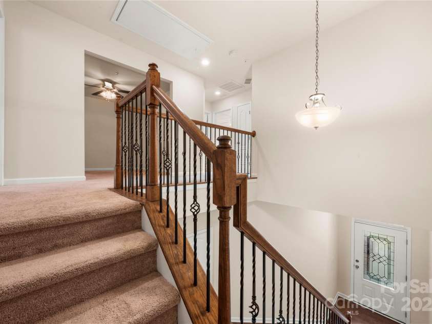 113 Burlingame Court, Mooresville, NC 28117.  MLS# CAR4228046, YatesRealty ID 1524. Upstairs offers a split floor plan with Flex Space overlooking the Foyer.