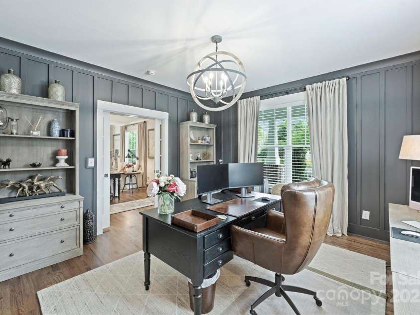 2829 Holt Street, Charlotte, NC 28205.  MLS# CAR4260071, YatesRealty ID 15243. Main level bedroom - front of house