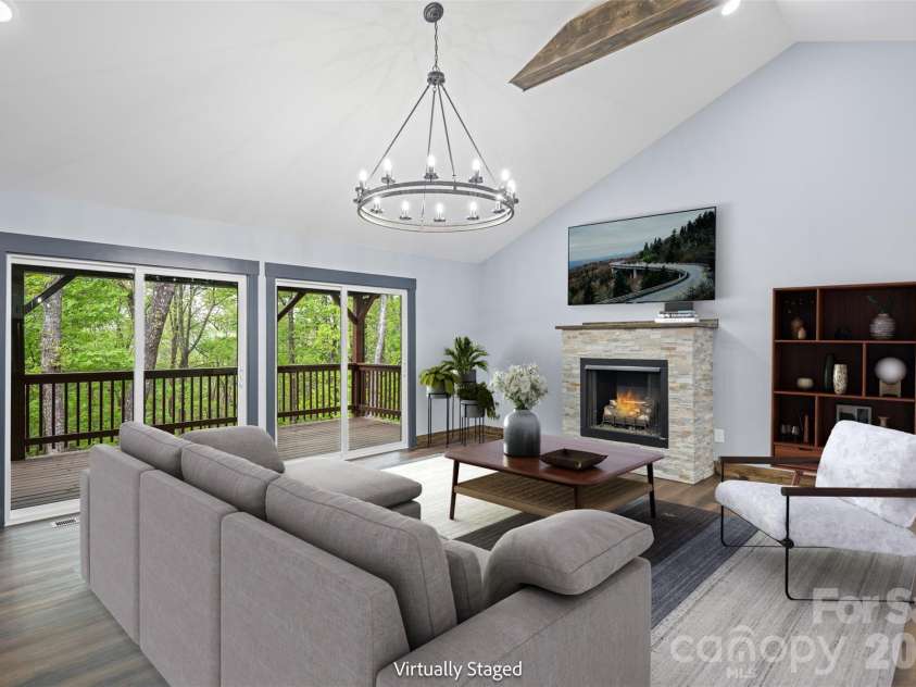 115 Pine Burr Drive, Purlear, NC 28665.  MLS# CAR4374403, YatesRealty ID 15245. Living Room - Virtually Staged