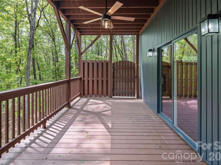 115 Pine Burr Drive, Purlear, NC 28665.  MLS# CAR4374403, YatesRealty ID 15245. Lower Level - Covered Porch