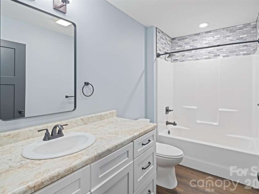 115 Pine Burr Drive, Purlear, NC 28665.  MLS# CAR4374403, YatesRealty ID 15245. Main Level - Guest Bathroom