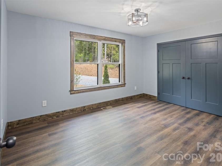 115 Pine Burr Drive, Purlear, NC 28665.  MLS# CAR4374403, YatesRealty ID 15245. Main Level - Guest Bedroom