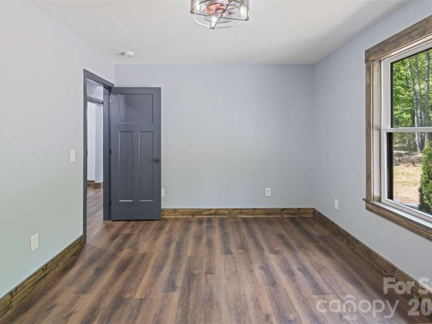 115 Pine Burr Drive, Purlear, NC 28665.  MLS# CAR4374403, YatesRealty ID 15245. Main Level - Guest Bedroom