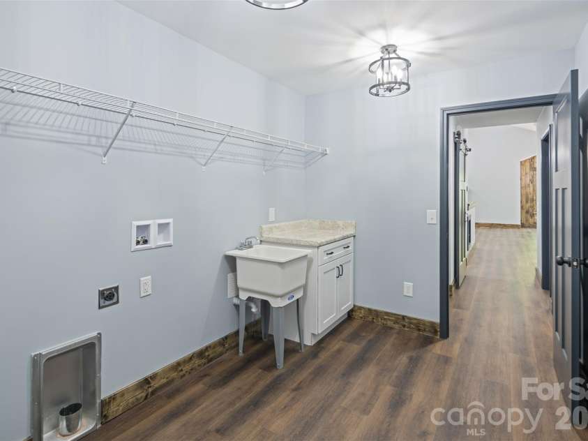115 Pine Burr Drive, Purlear, NC 28665.  MLS# CAR4374403, YatesRealty ID 15245. Main Level - Laundry/Mud Room off Garage