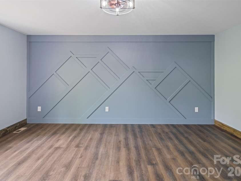 115 Pine Burr Drive, Purlear, NC 28665.  MLS# CAR4374403, YatesRealty ID 15245. Main Level - Primary Bedroom Suite