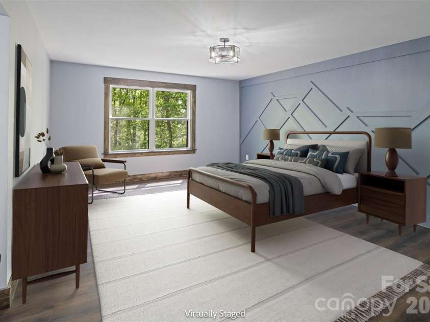 115 Pine Burr Drive, Purlear, NC 28665.  MLS# CAR4374403, YatesRealty ID 15245. Main Level - Primary Bedroom Suite - Virtually Staged