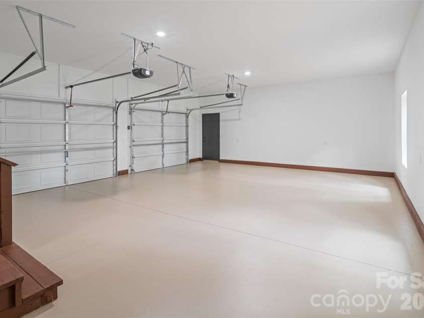 115 Pine Burr Drive, Purlear, NC 28665.  MLS# CAR4374403, YatesRealty ID 15245. Oversized Attached Garage