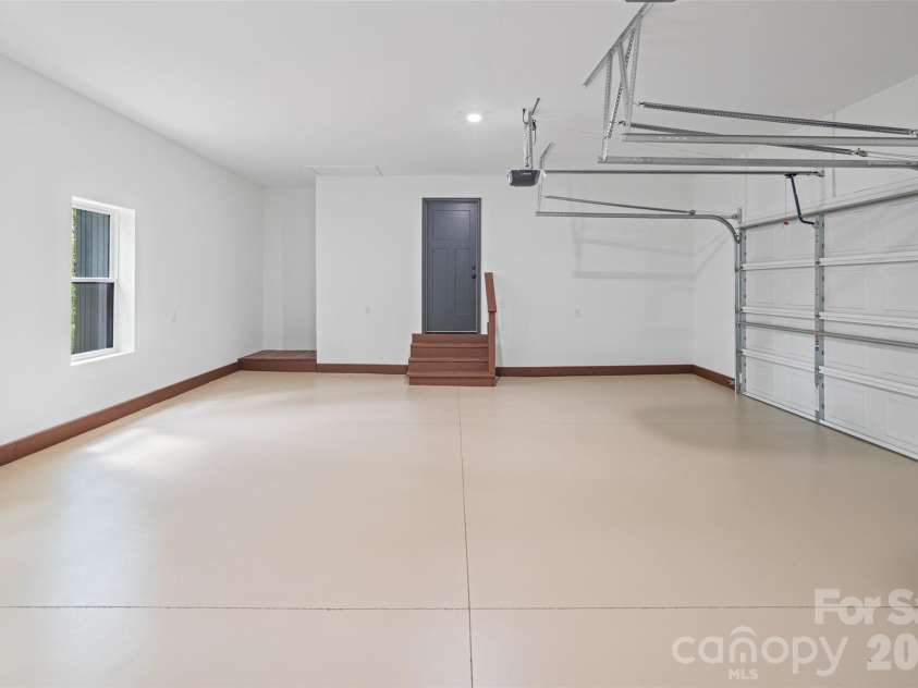 115 Pine Burr Drive, Purlear, NC 28665.  MLS# CAR4374403, YatesRealty ID 15245. Oversized Attached Garage