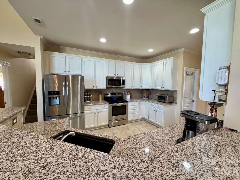 4633 Triumph Drive, Concord, NC 28027.  MLS# CAR4374411, YatesRealty ID 15247. 